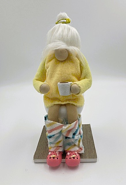 Lady in Yellow with crocs Potty Gnome